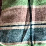 Brown, blue, cream and green stripe wool vest